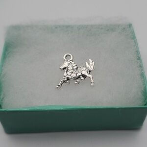 Dashing stallion unicorn‎ horse charm